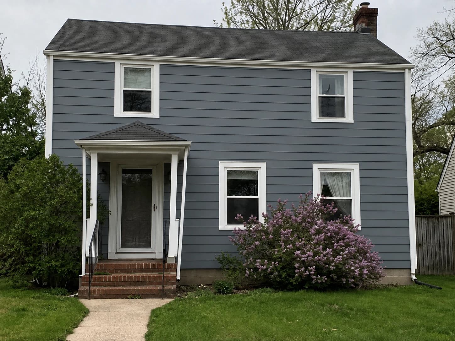 AI-generated illustrative after view: Blue Gray Siding Transformation, Passaic, NJ